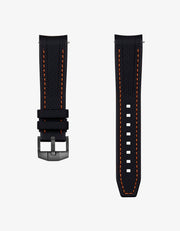 Black vertech rubber watch strap with orange stitching on a white background