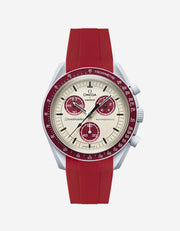A burgundy curved rubber watch strap with a stainless steel buckle, designed for the Omega X Swatch MoonSwatch Mission to Pluto watch.