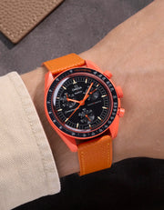 Orange Epsom leather strap on Omega X Swatch MoonSwatch Mission on Earth Lava – wrist shot