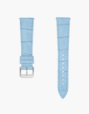 Light blue alligator leather watch strap with silver buckle on a white background
